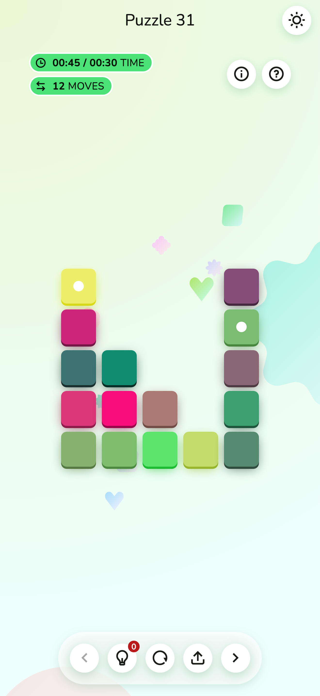 A current Iro-Iro puzzle on a phone screen: green and pink rounded tiles in a wide U-shaped arrangement