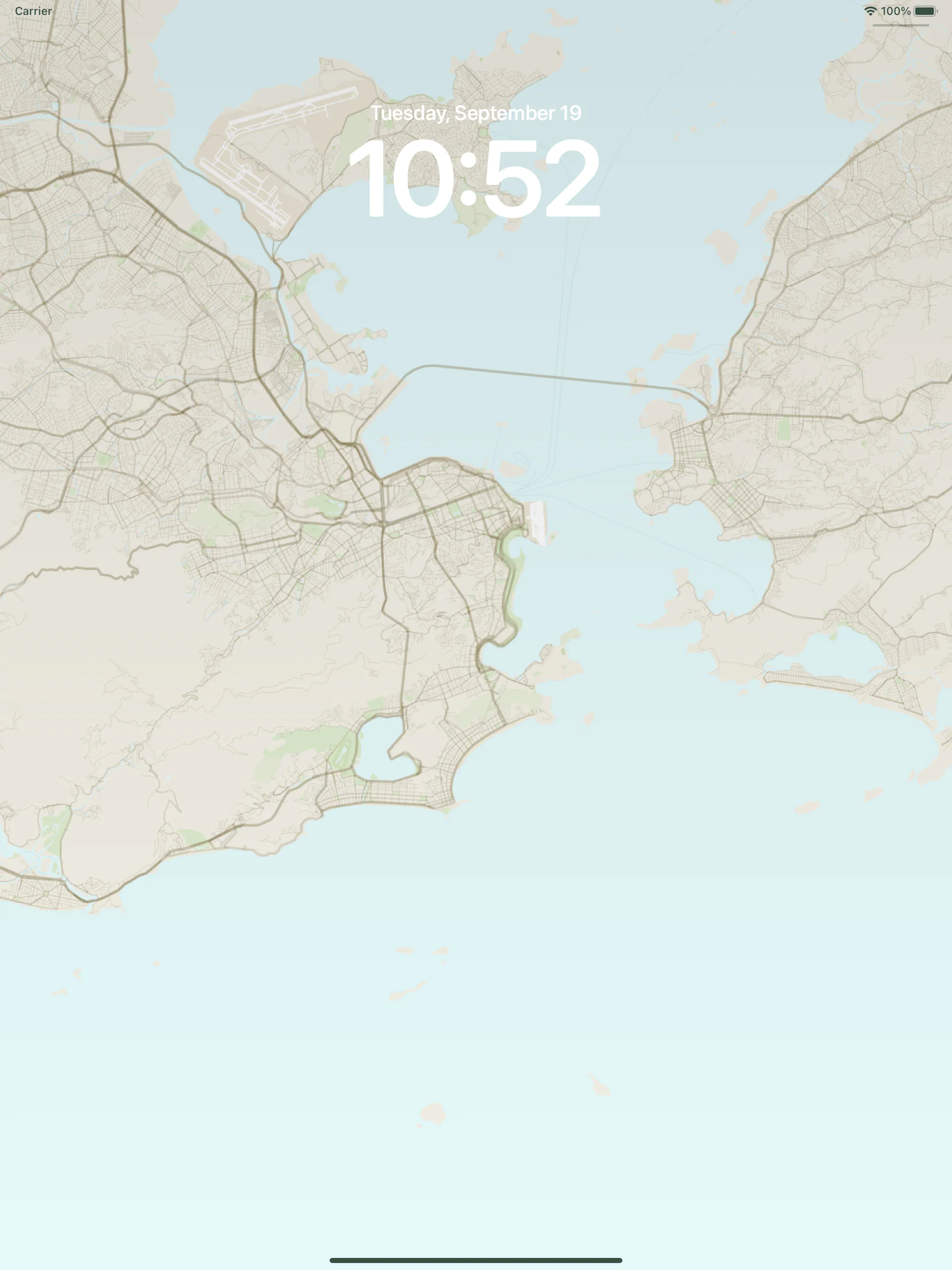 An iPad lock screen using a WMap wallpaper: a light beige and grey street map of Venice and its surrounding islands, with the time shown in large white text