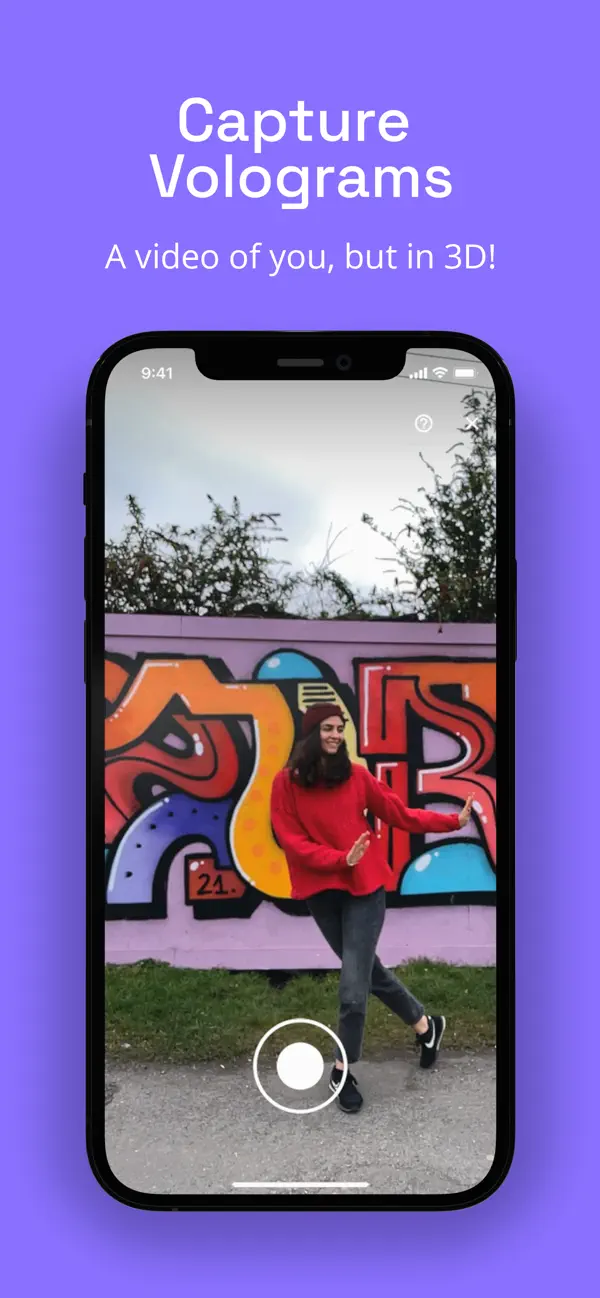 Volu capture screen on iPhone, recording a person in red dancing in front of a colourful graffiti wall, with a circular record button at the bottom